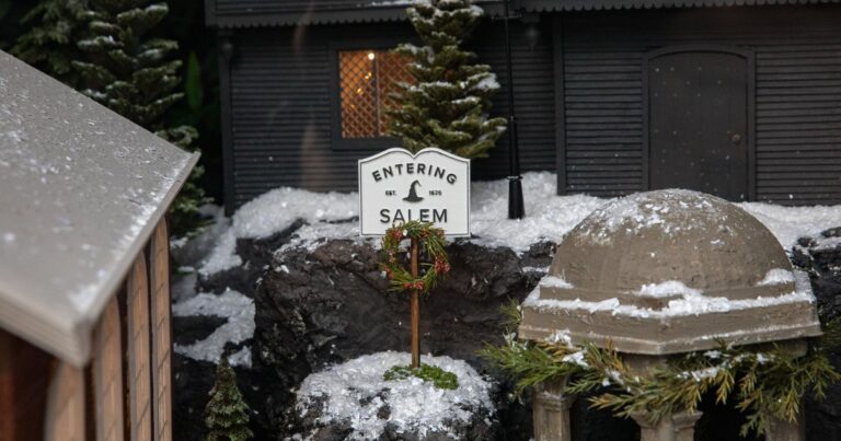 Snowy holiday display with an Entering Salem sign Snowy holiday display with an Entering Salem sign