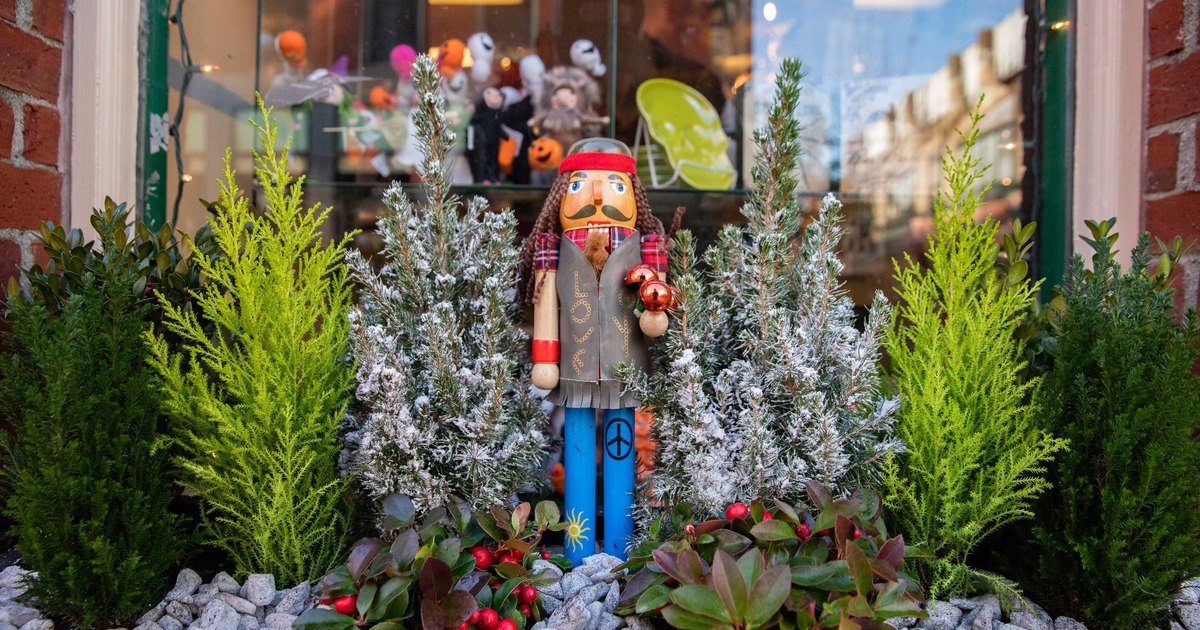 Nutcracker and winter greenery in a downtown Salem shop window